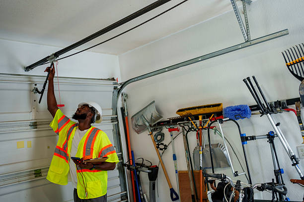 Professional Garage Door Installation technician working in Bethel Manor, VA